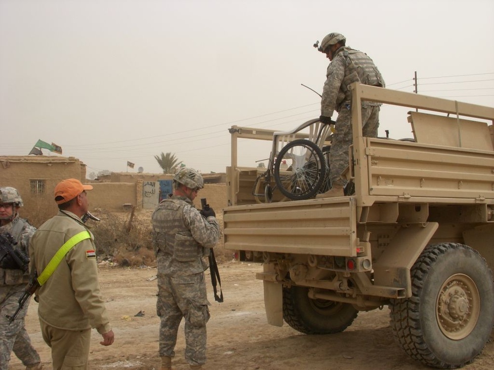 1-10 FA Soldiers deliver wheelchairs to disabled citizens