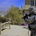 Forward observers paint targets for artillery strike in Mosul