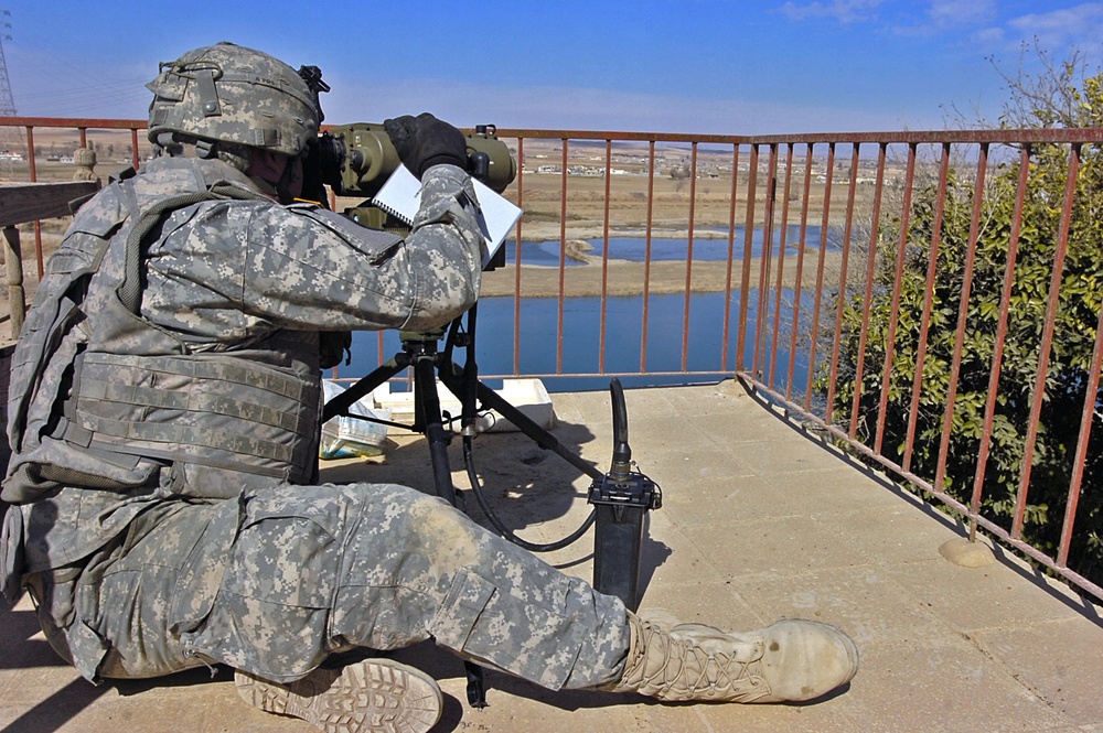 Forward observers paint targets for artillery strike in Mosul