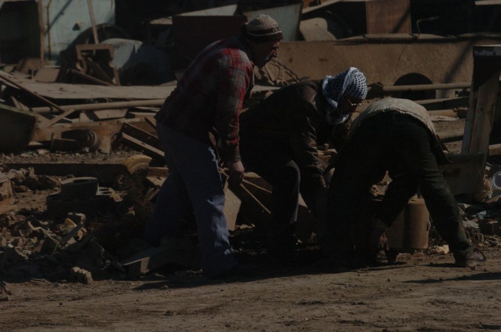 Iraqi Security Forces, local shop owners clean up Four Corners market district