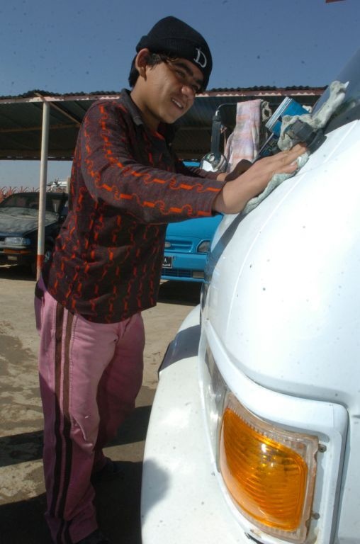 Iraqi Security Forces, local shop owners clean up Four Corners market district