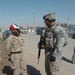 Iraqi Security Forces, local shop owners clean up Four Corners market district