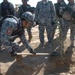 Iraqi Security Forces, local shop owners clean up Four Corners market district