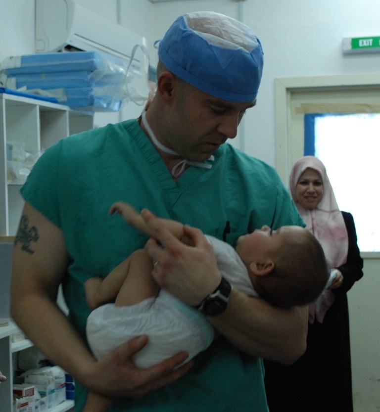 948th FST Begin Lifesaving Procedures on Iraqi Baby