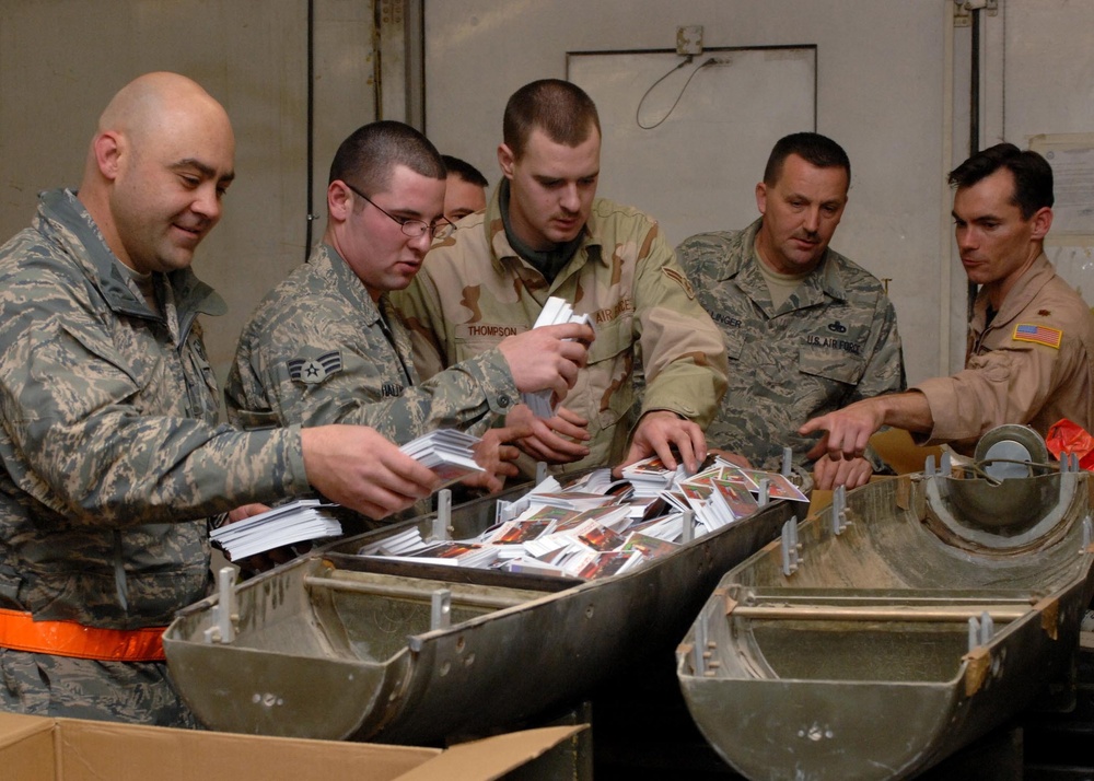 Air Force team prepares leaflets