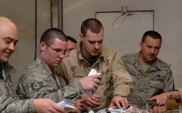 Air Force team prepares leaflets