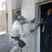 Iraqi police trainees conduct close quarters battle drills