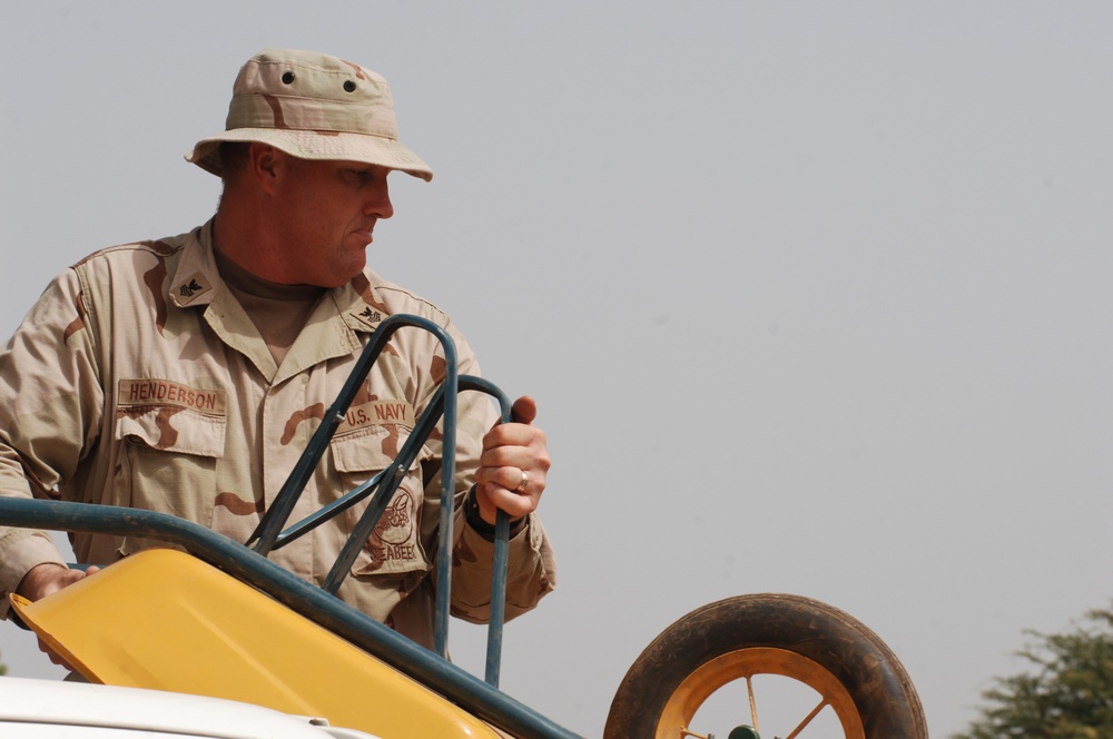 Marines, Sailors hand out supplies to villagers in Petit Douda, Djibouti