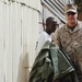 Marines, Sailors hand out supplies to villagers in Petit Douda, Djibouti