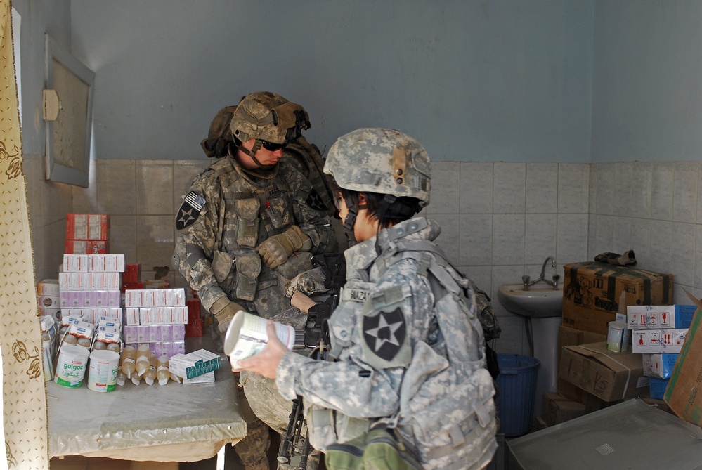 IA,CF Soldiers provide free healtcare to O'couba citizens