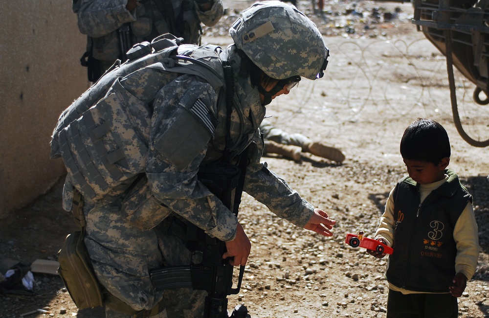 IA, CF Soldiers Provide Free Health Care for O'couba Citizens