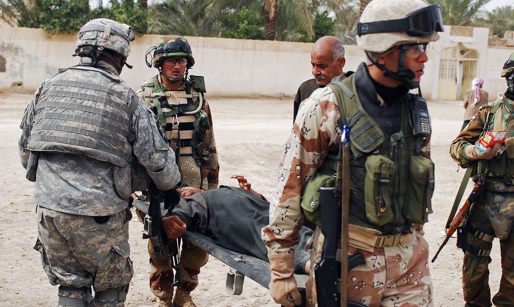 IA, CF Soldiers Provide Free Health Care for O'couba Citizens