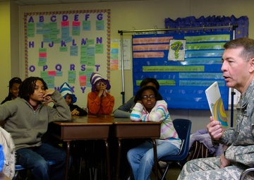 USARCENT DCG reads books at local school