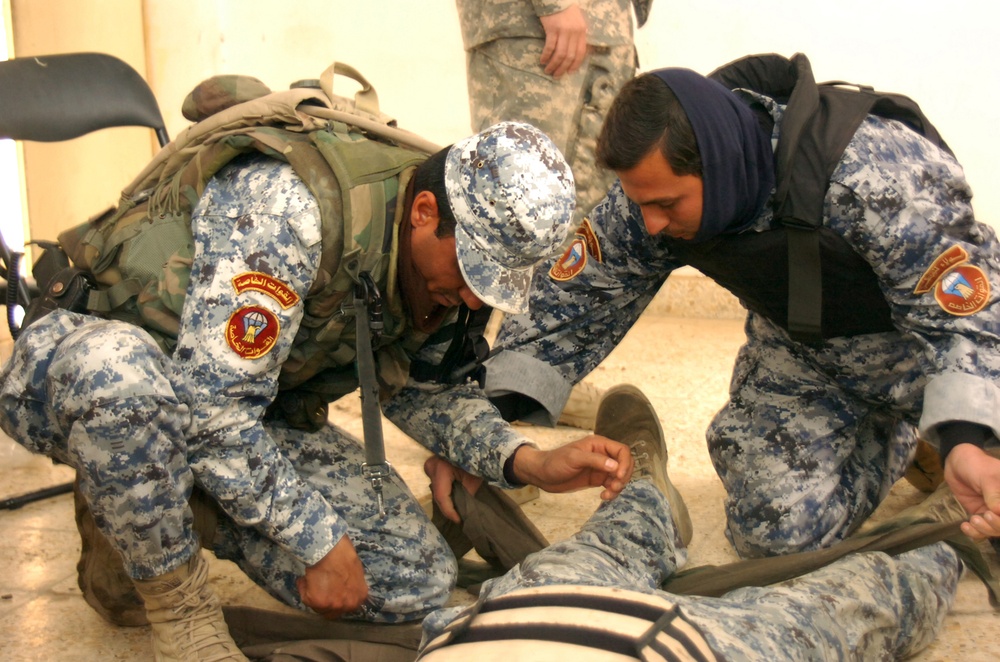 NPTT Soldiers train National Police in combat lifesaving skills