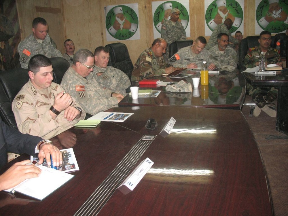 Coalition forces discuss security with Mada'in Qada leaders
