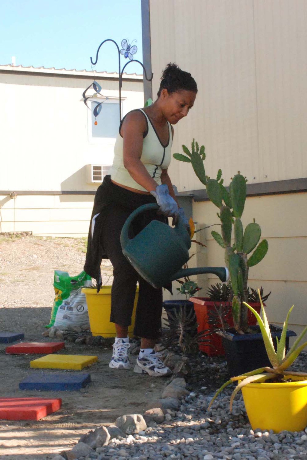Cuzco Barracks Resident Brightens Lives With Colorful Garden