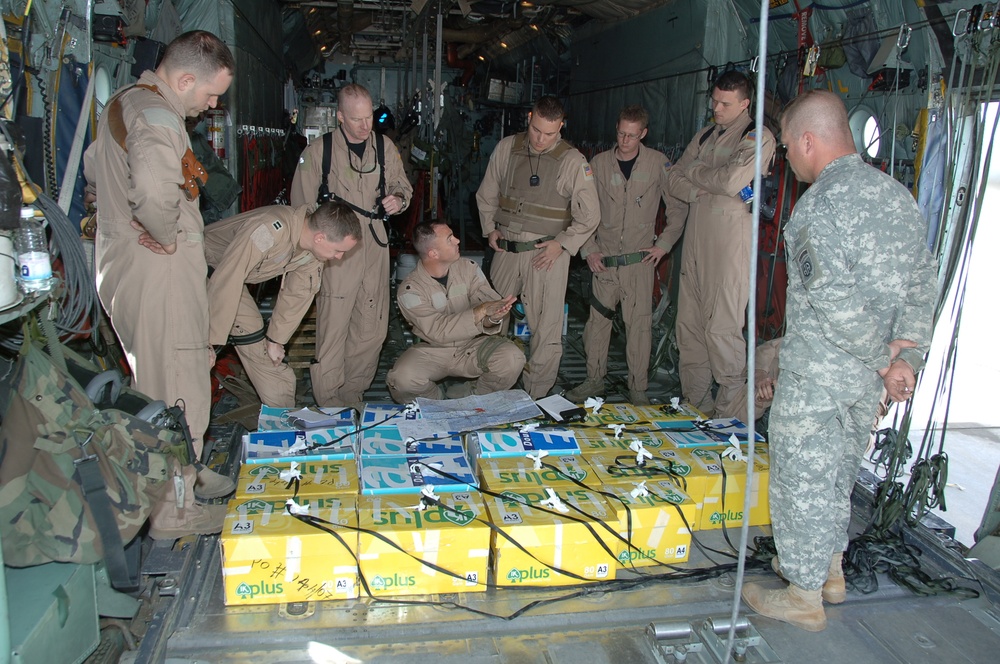 Airmen aid coalition ground forces one leaflet at a time