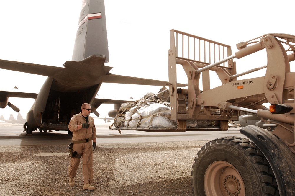 737th Expeditionary Airlift Squadron transporting coaliition forces