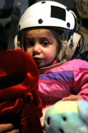 Marines transport precious cargo, reunite healthier toddler with family