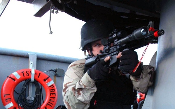 Sailors Preform a Non-compliant Boarding Simulation