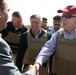 Senator John McCain steps on deck, surveys progress