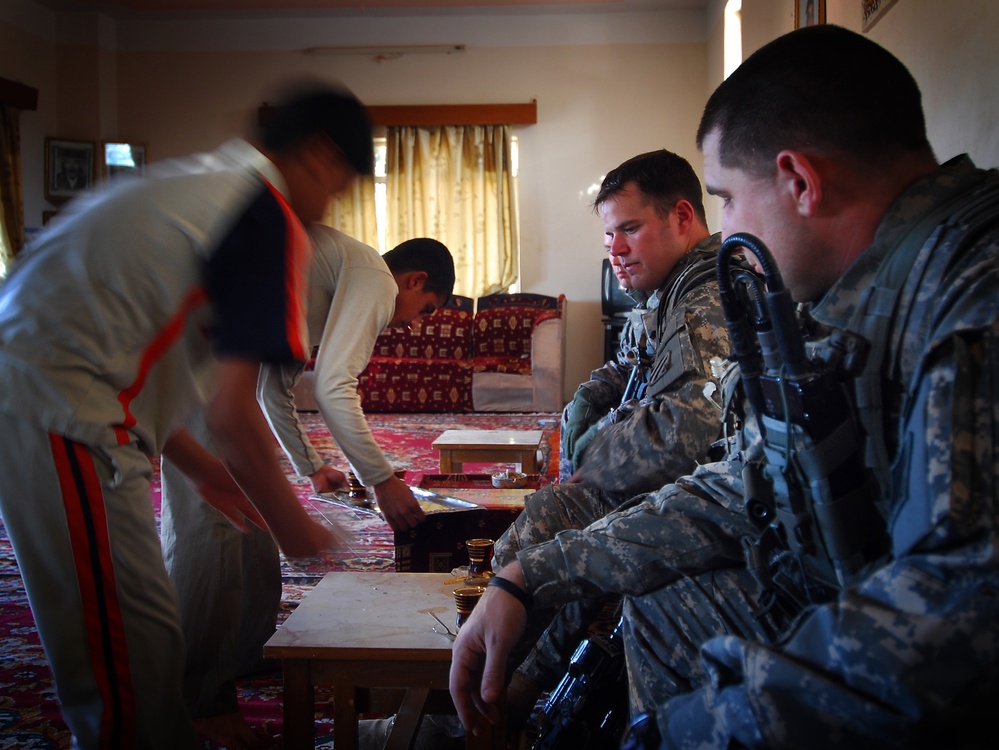 All in a Day's Work: Soldiers Meet With Sheiks, Chase Insurgents