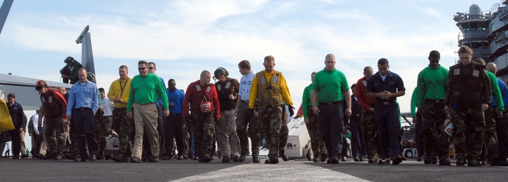 Sailors Take Part in a Foreign Object Damage Walk