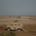 Soldiers patrol Minari Village