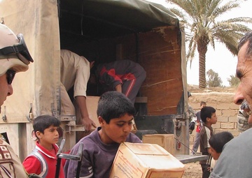 Soldiers deliver food, toys to Gurtan village