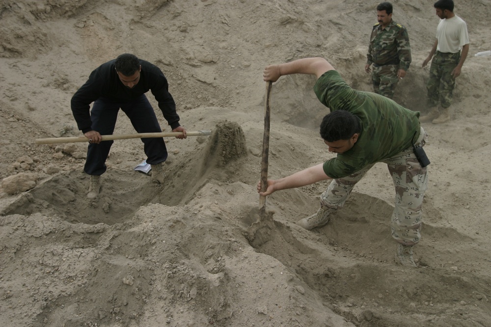 Iraqi security forces and Marines uncover 4,000 pound cache