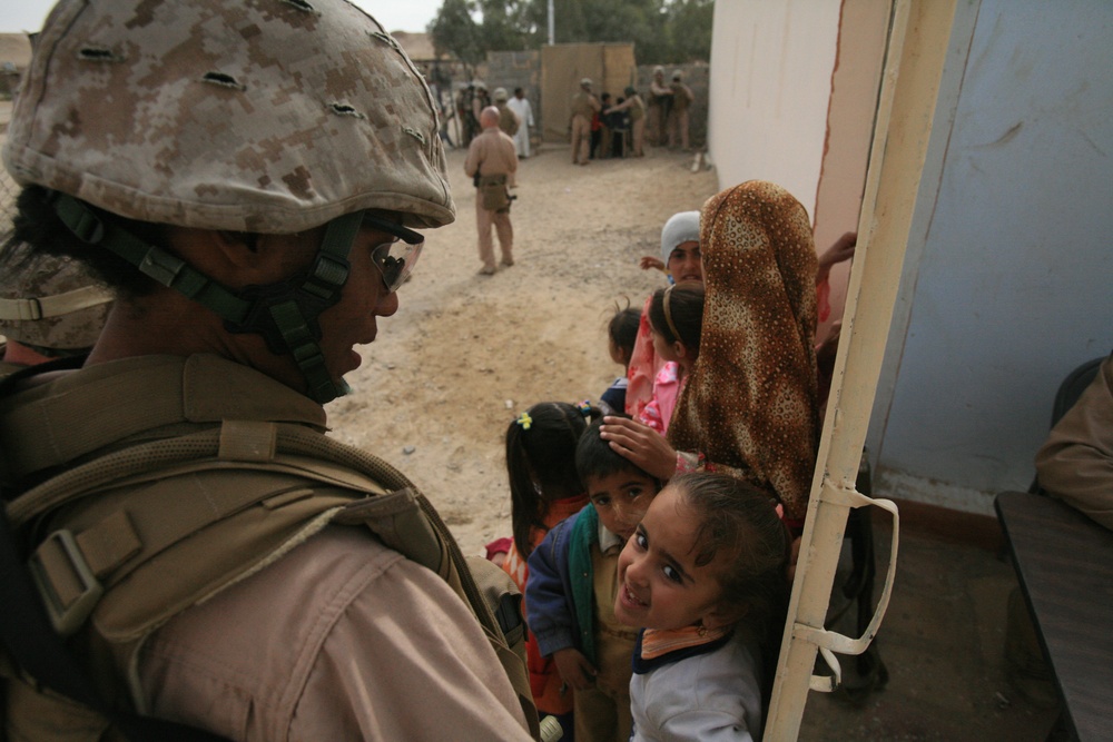 Iraqi Women's Engagement: Service Members Reach Out to Women and Children