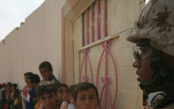 Iraqi Women's Engagement: Service Members Reach Out to Women and Children