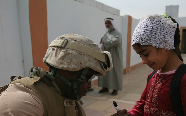 Iraqi Women's Engagement: Service Members Reach Out to Women and Children