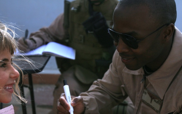 Iraqi Women's Engagement: Service Members Reach Out to Women and Children