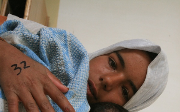 Iraqi Women's Engagement: Service Members Reach Out to Women and Children