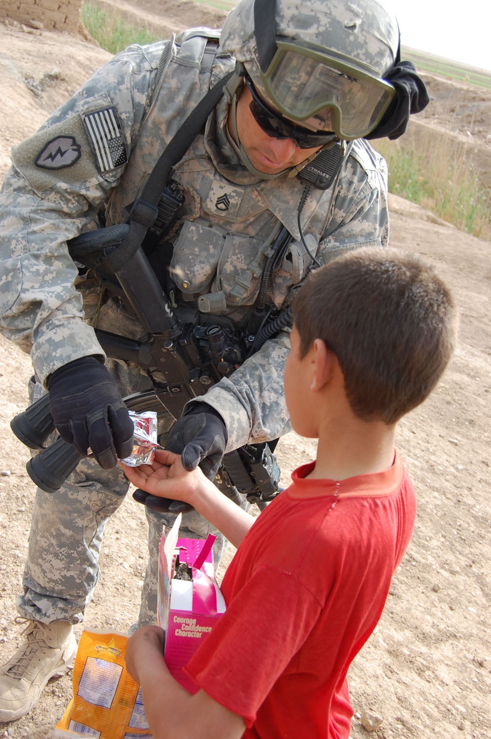 Wolfhounds give back to people of Taji