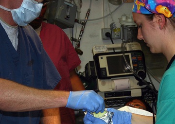 Coalition Forces Save Iraqi Teenager Injured by IED