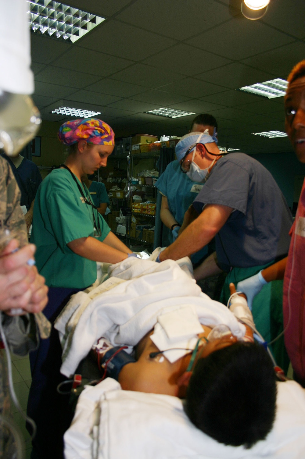 Coalition Forces Save Iraqi Teenager Injured by IED