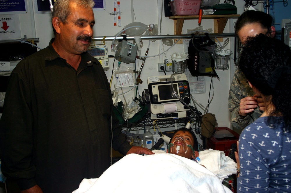 Coalition Forces Save Iraqi Teenager Injured by IED