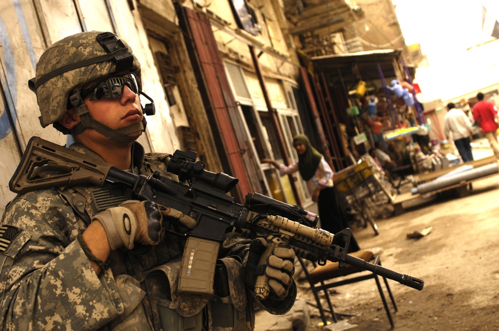 Cavalry Soldiers patrol Baghdad book market