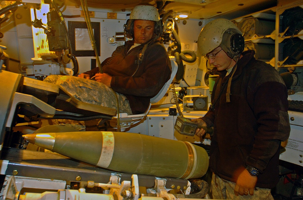 Paladin Howitzers fire rounds in support of ground troops