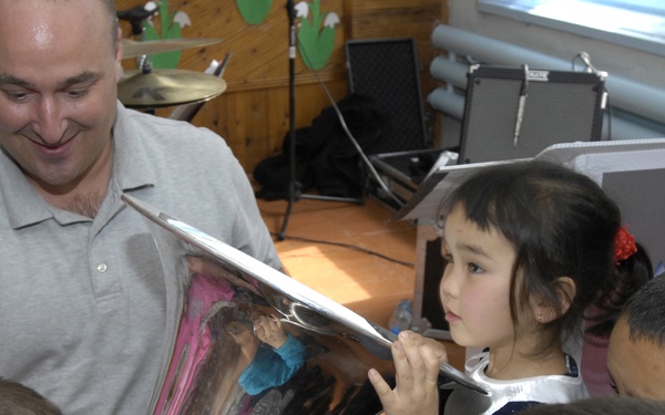 Band members connect with Bishkek music students