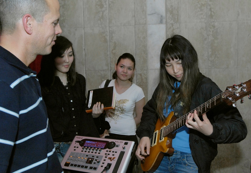 Band members connect with Bishkek music students