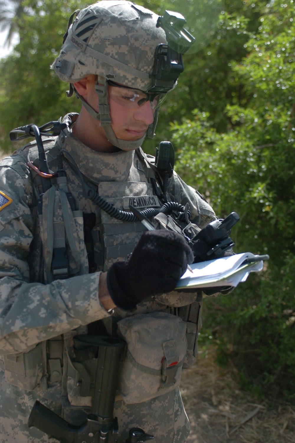 Soldiers assess orchards in al Buaytha