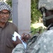Soldiers assess orchards in al Buaytha