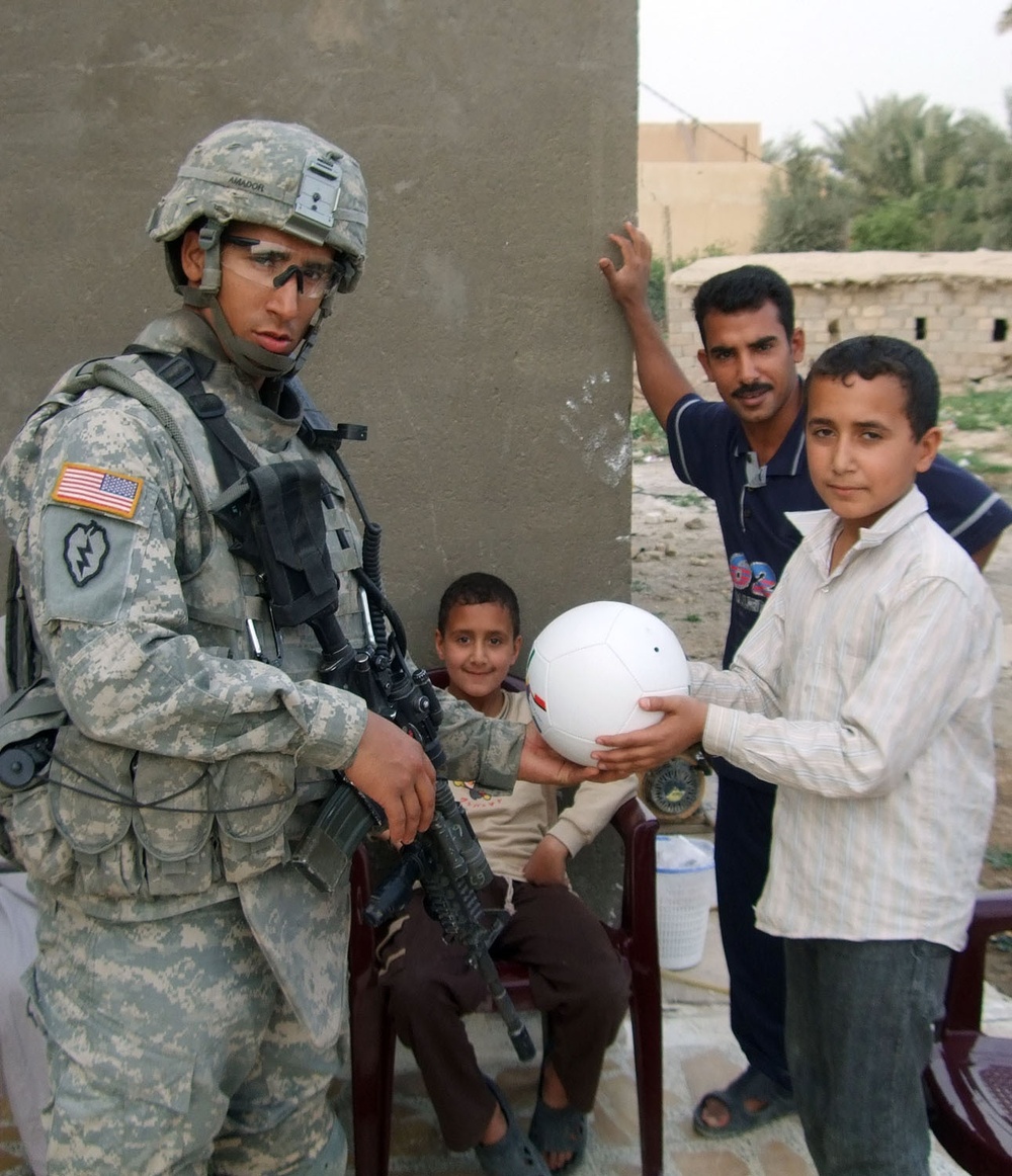 Gimlets hand out soccer balls
