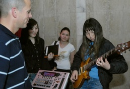 Band members connect with Bishkek music students