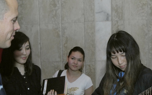 Band members connect with Bishkek music students