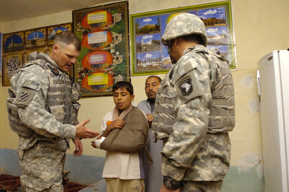 Coalition forces help boy get medical treatment