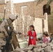 Marines make kids happy during patrol